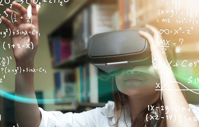 A girl performing mathematics using a virtual reality box